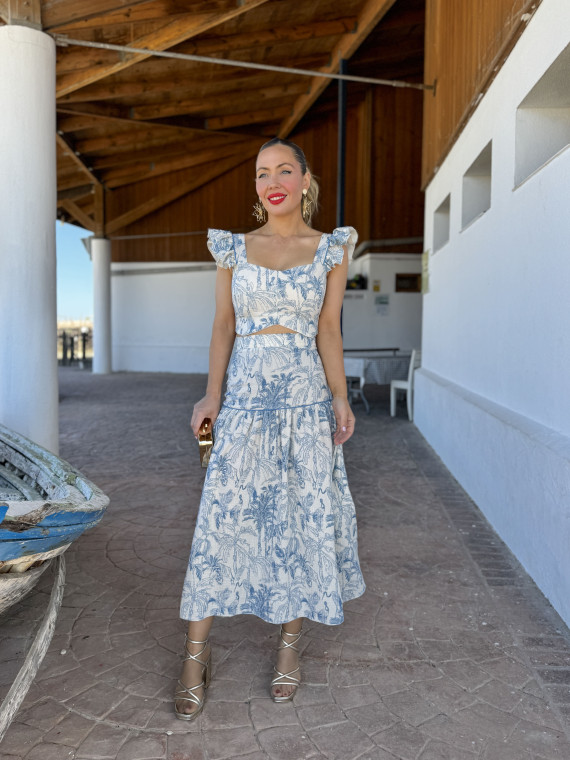 Conjunto de dos piezas compuesto por top y falda  de vuelo.