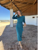 Vestido de fiesta midi en color turquesa ideal para ser una invitada.