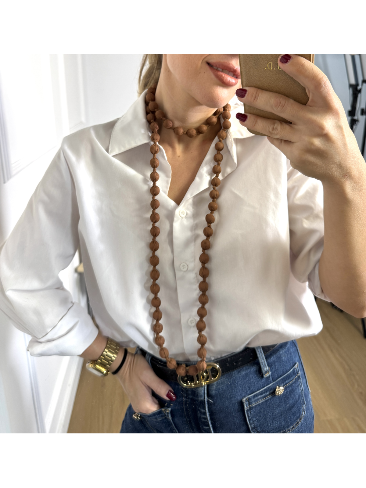 Collar largo de bolas de madera forradas de tela, un complemento ideal