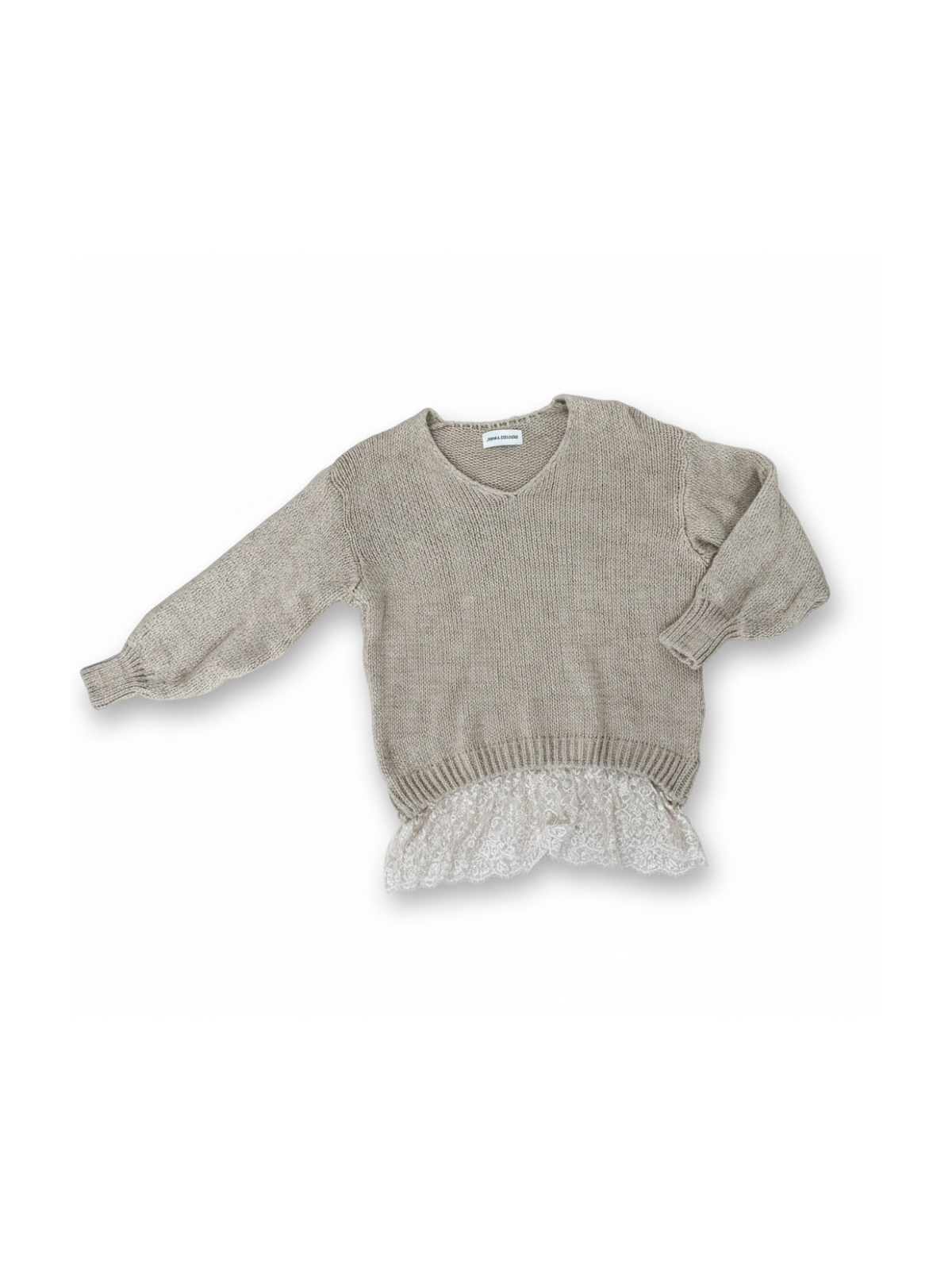 Jersey de punto oversize con detalle de encaje en bajo.