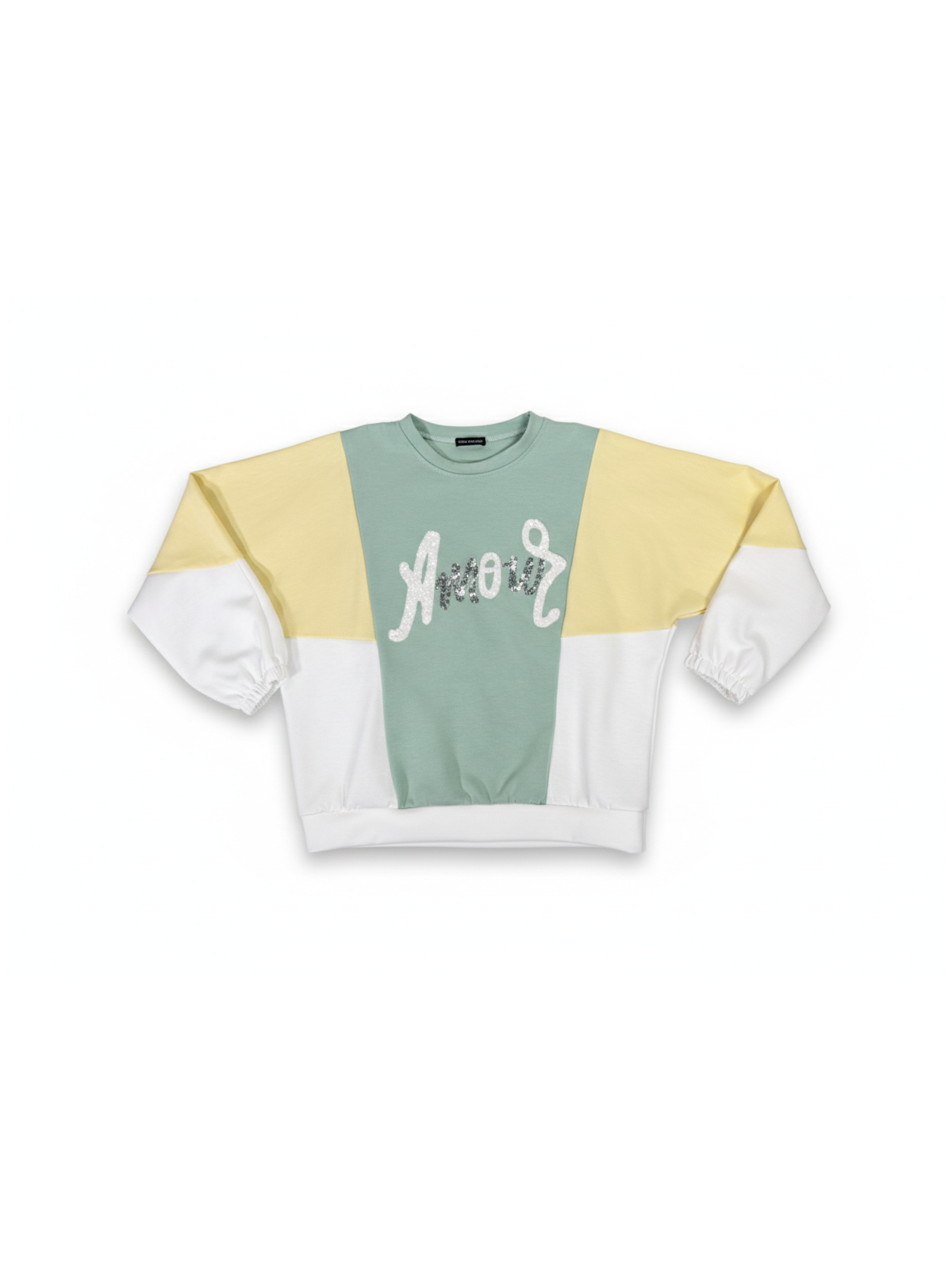 Sudadera combinada en tonos verde agua, amarillo pastel y blanco.