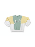 Sudadera combinada en tonos verde agua, amarillo pastel y blanco.