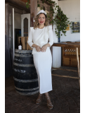 Vestido midi en color blanco.