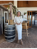 Vestido midi en color blanco.