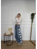 Pantalón vaquero wide leg de tiro medio-alto con estrellas.