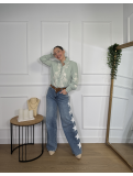 Pantalón vaquero wide leg de tiro medio-alto con estrellas.