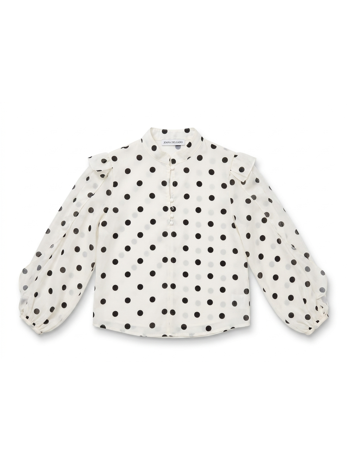 Blusa de organza con estampado de lunares en contraste.