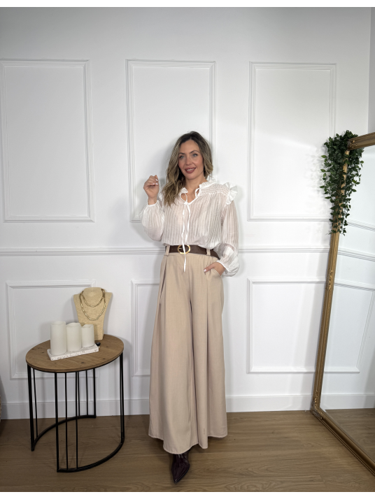 Pantalón estilo palazzo en color liso.