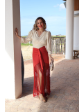 Elegante falda bordada con flecos.
