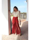 Elegante falda bordada con flecos.