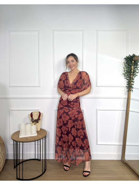 Vestido midi estampado de diseño drapeado.