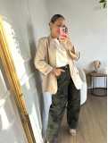 Blazer lisa de corte abierto con cuello de solapa.
