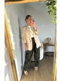 Blazer lisa de corte abierto con cuello de solapa.